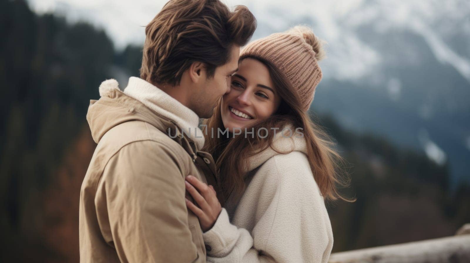 A man and woman are hugging in front of a mountain