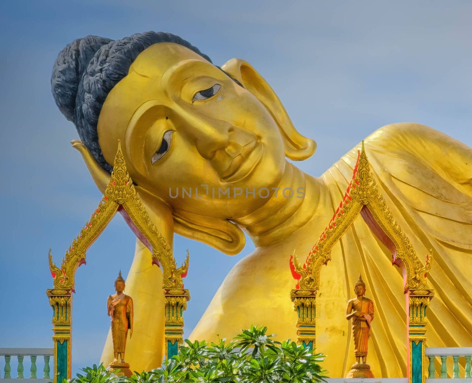Golden Buddha statue at Wat Sri Sunthon temple, Phuket, Thailand by Elenaphotos21