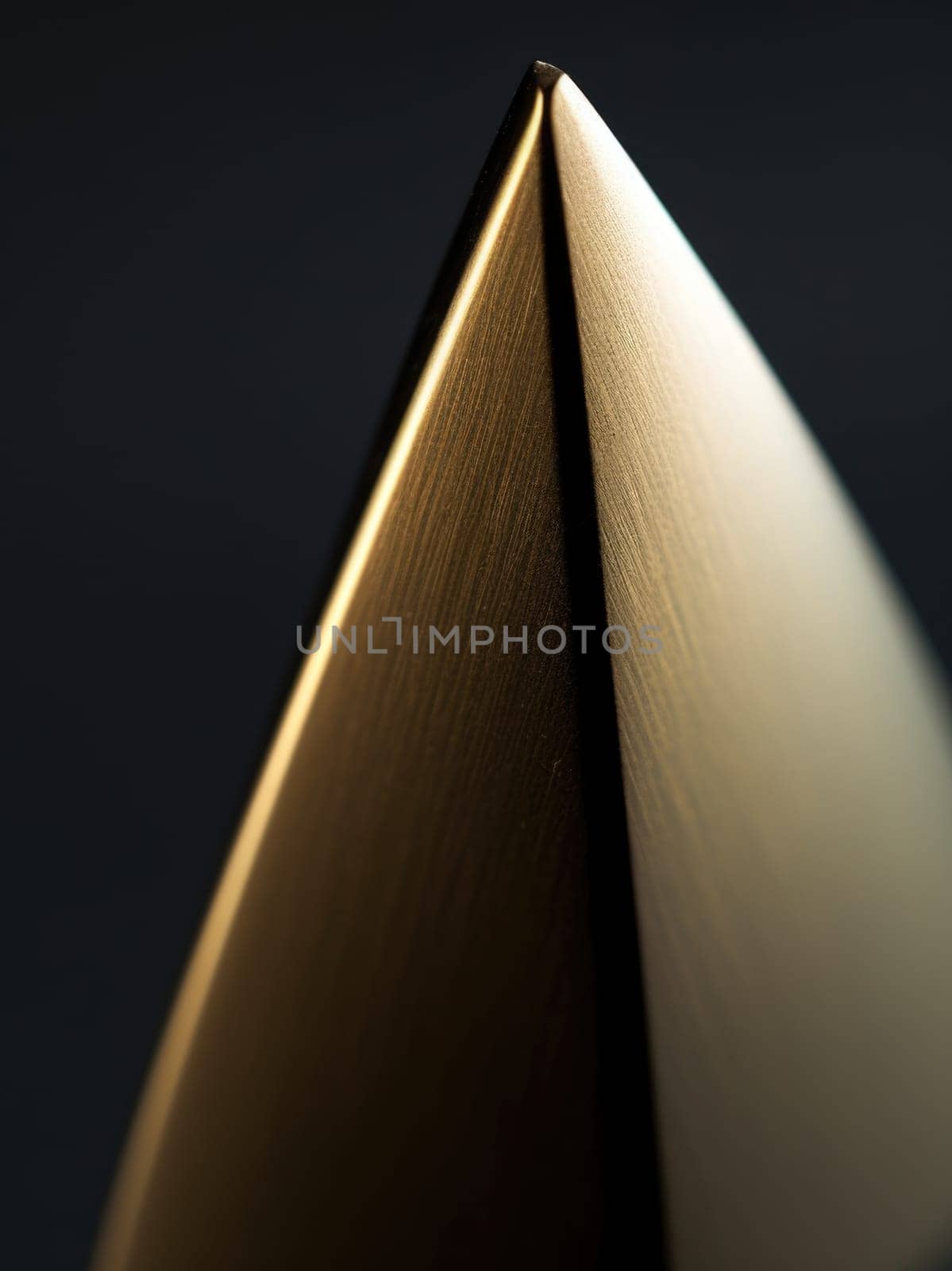 A golden triangle with a black background