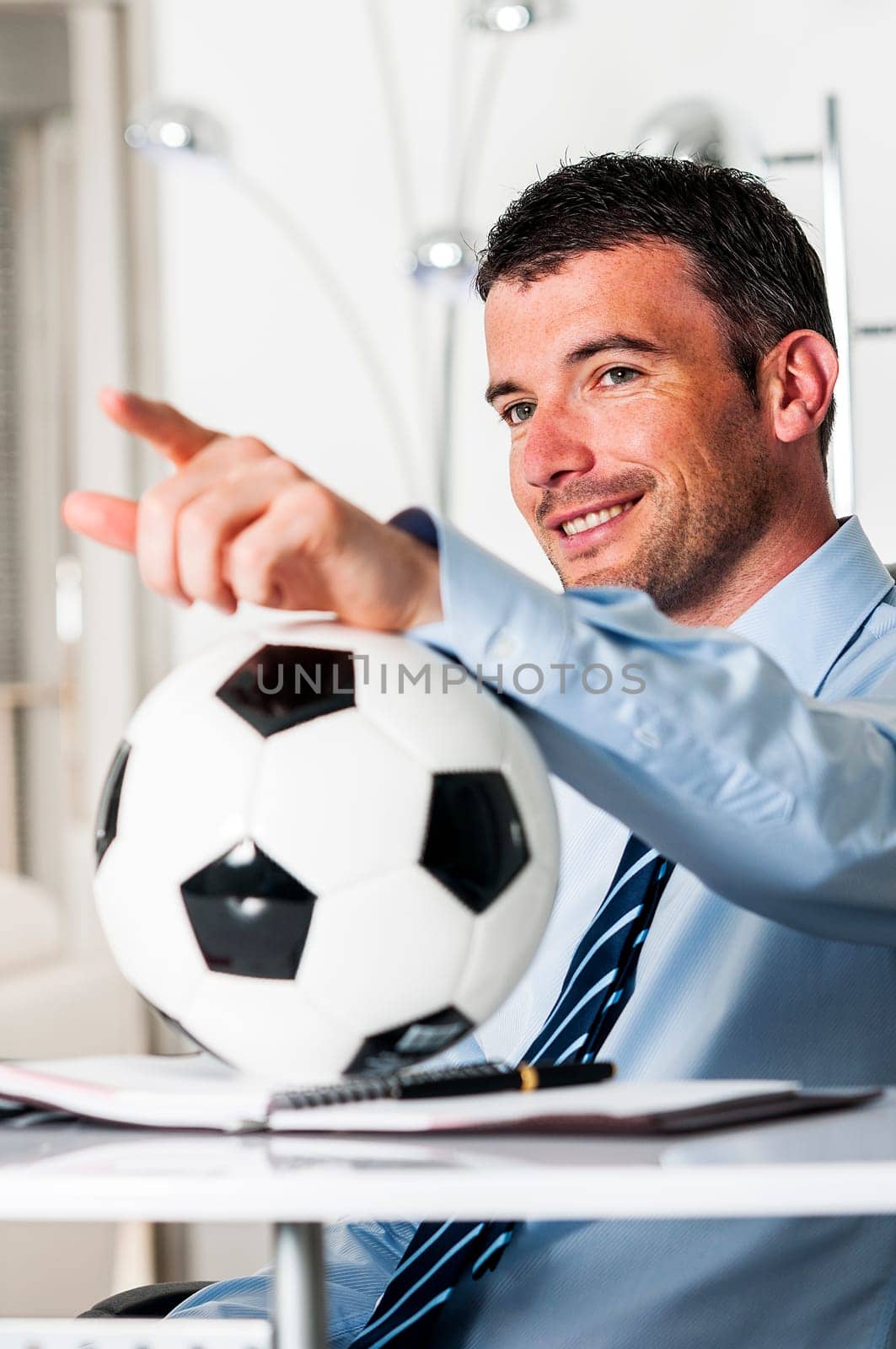 Business man with football