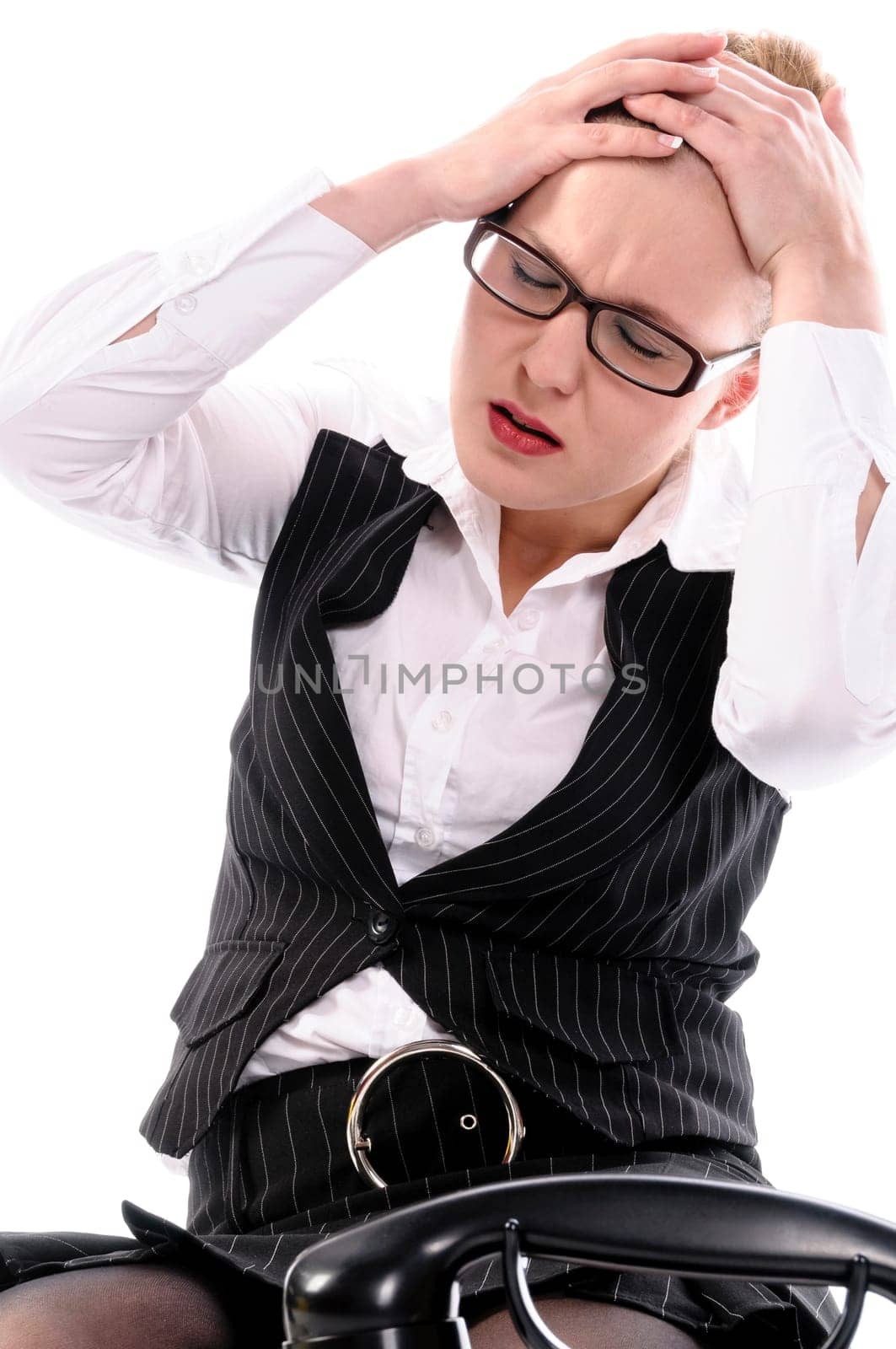 Young businesswoman Woman with blond hair in a business suit (tax consultant,manager,secretary) on the phone in front of a white background