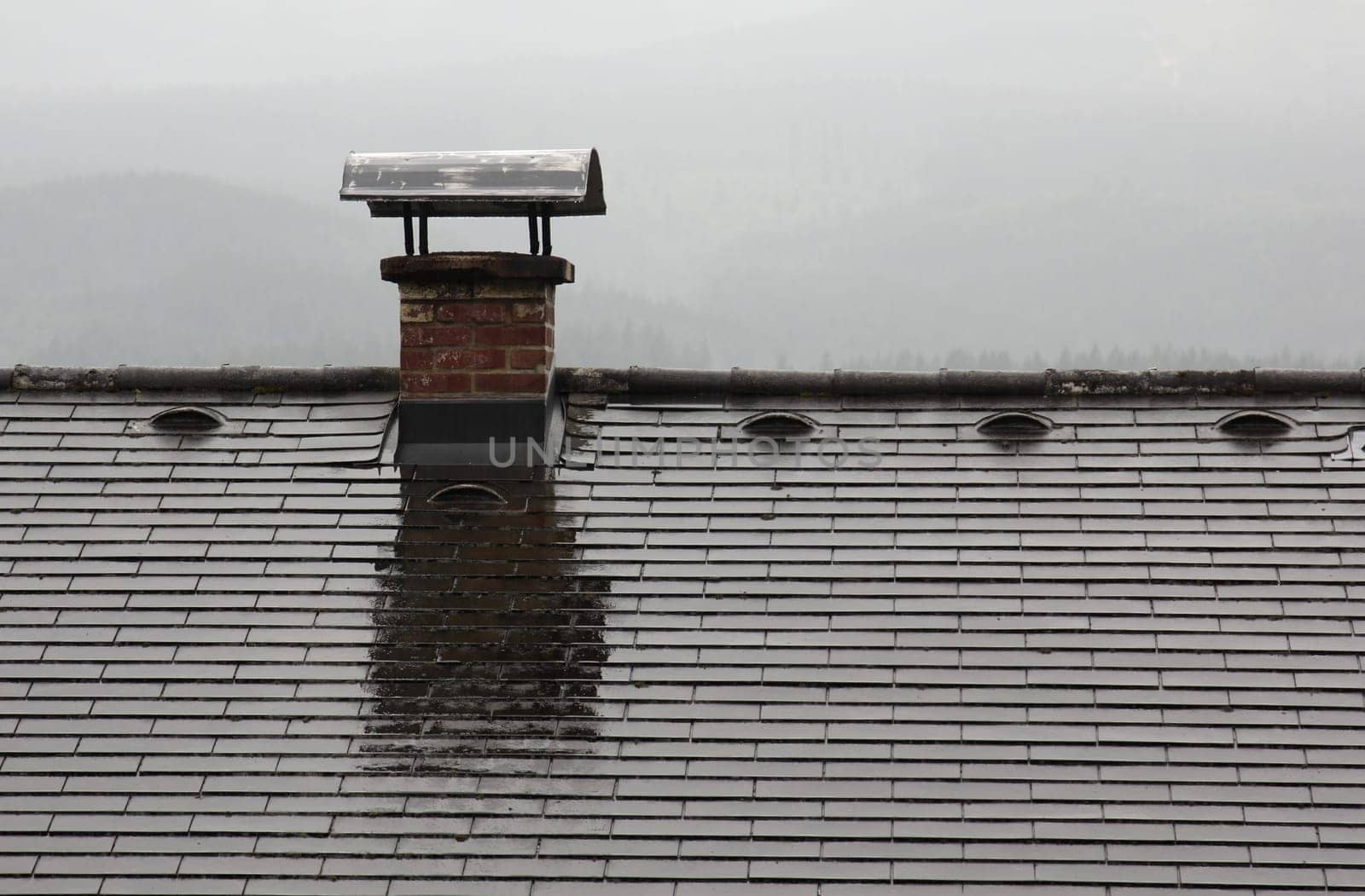 The old chimney on the top of the roof
