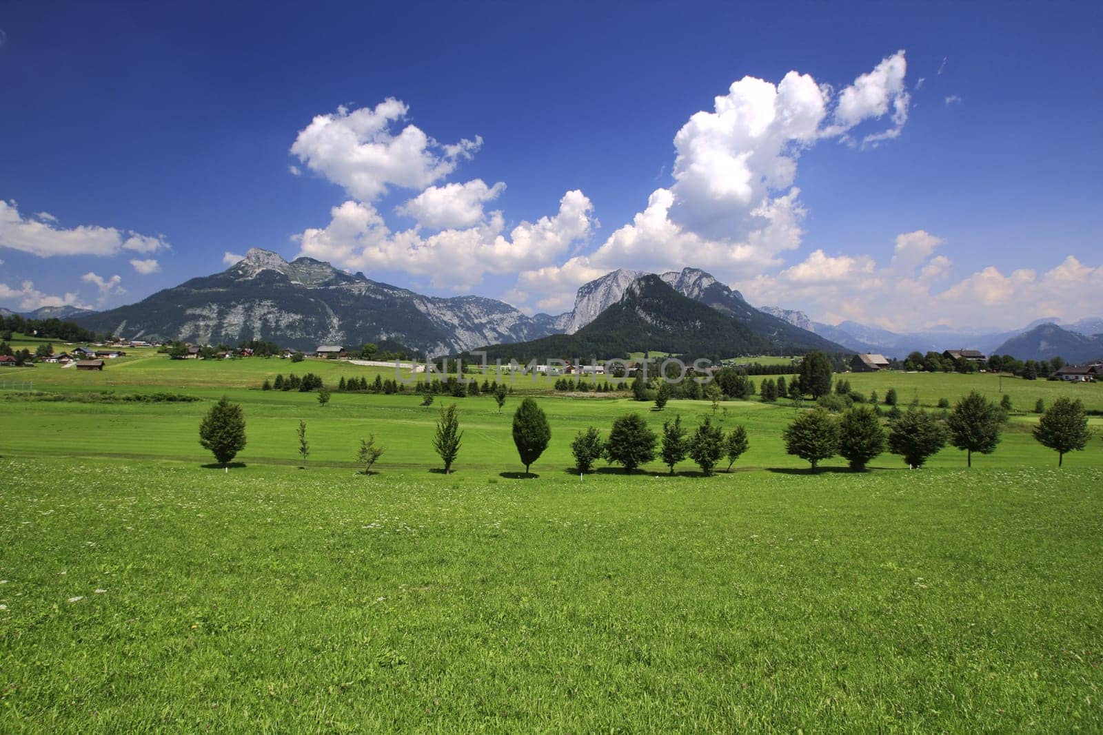 austria large panorama of the mountains above the blue sky