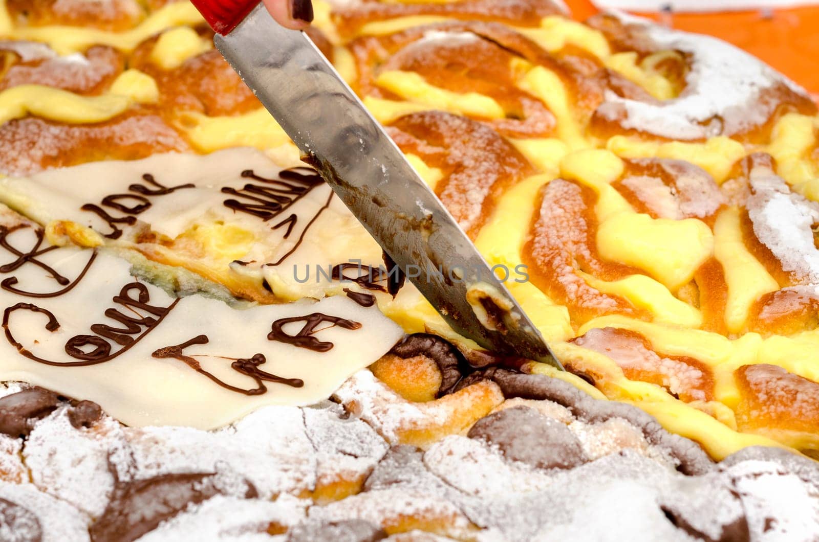 cake split in half with cream and sugar