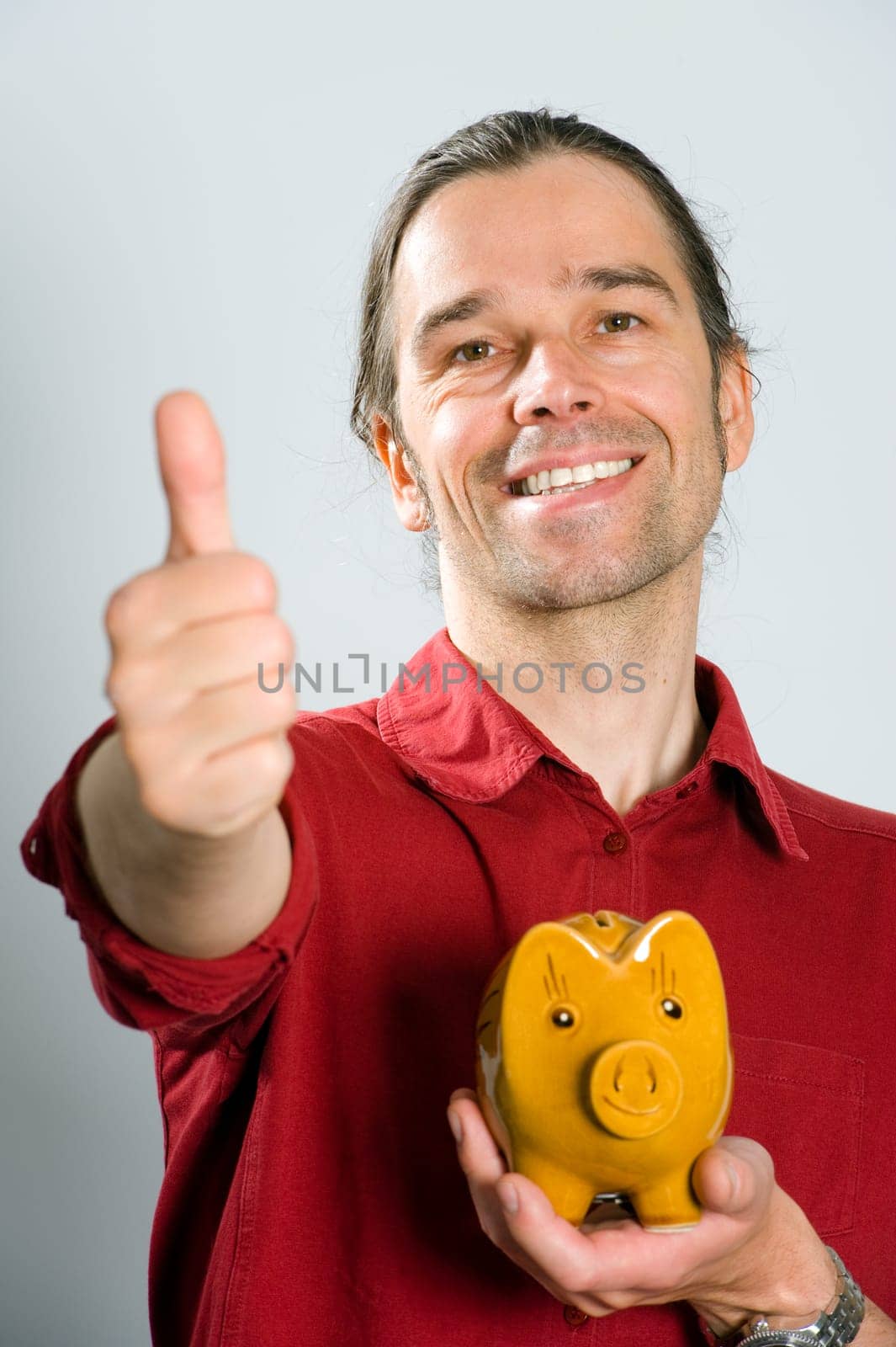 Man with Piggy Bank
