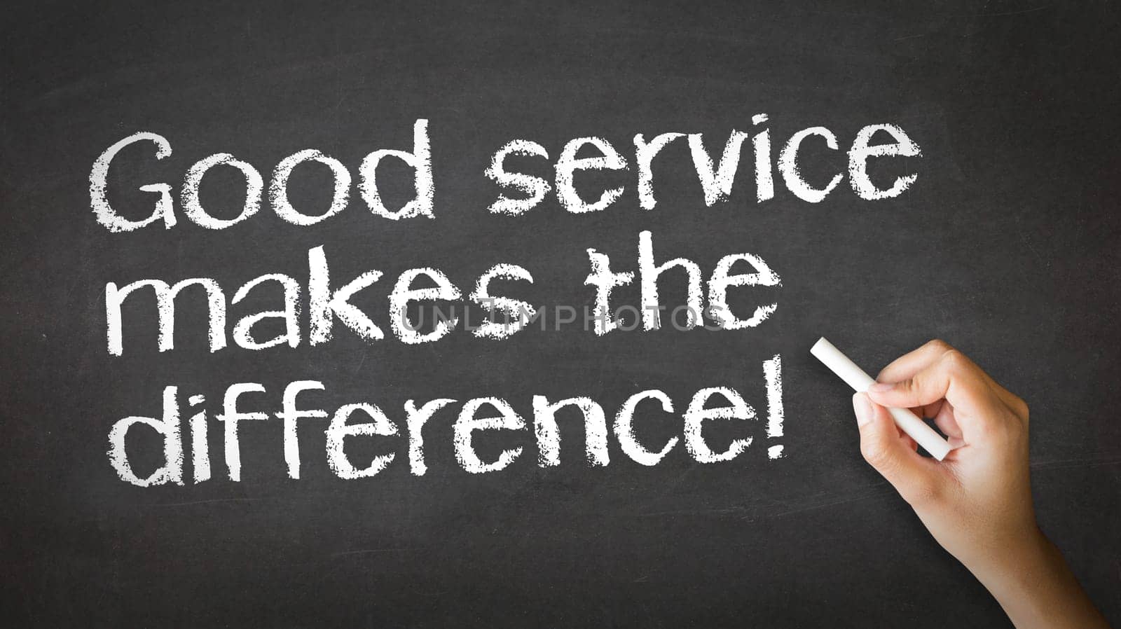 A person drawing and pointing at a Good Service makes the difference Chalk Illustration