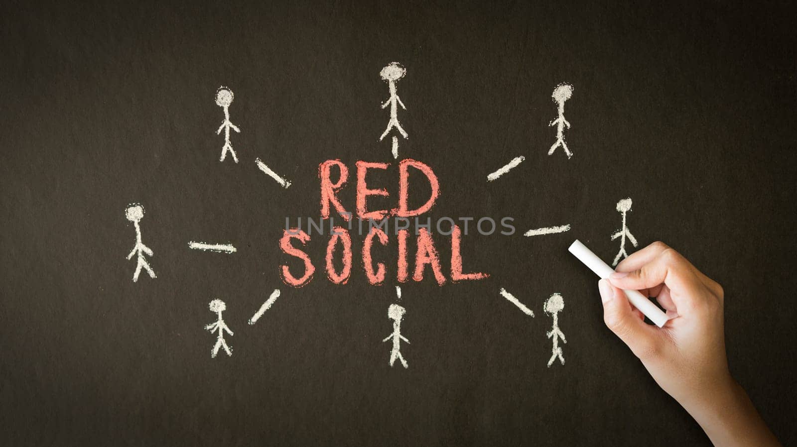 A person drawing and pointing at a Social Network Chalk Drawing