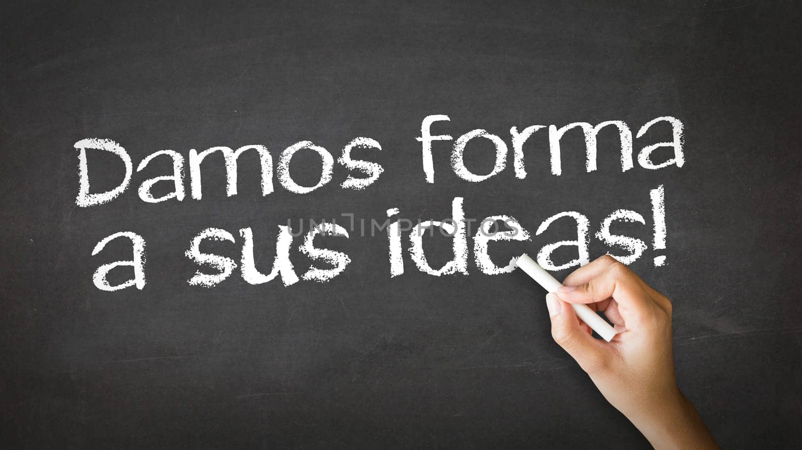 A person drawing and pointing at a We Shape Your Ideas Chalk Illustration