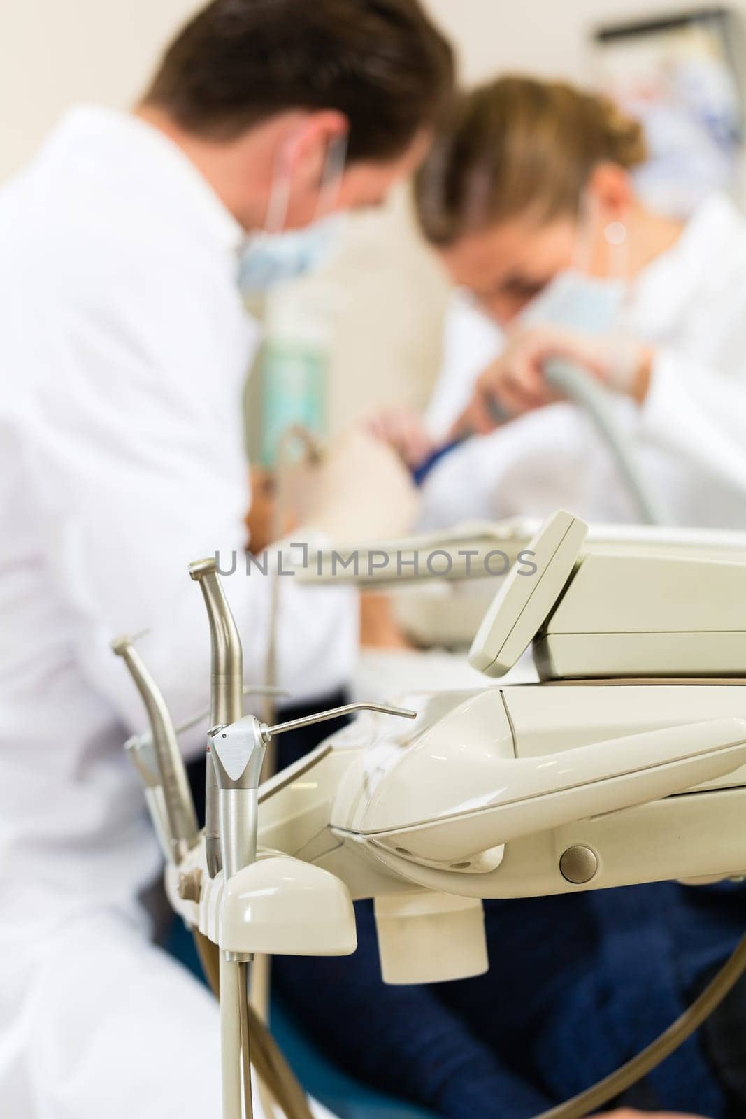 Patient at dentist - treatment with drilling