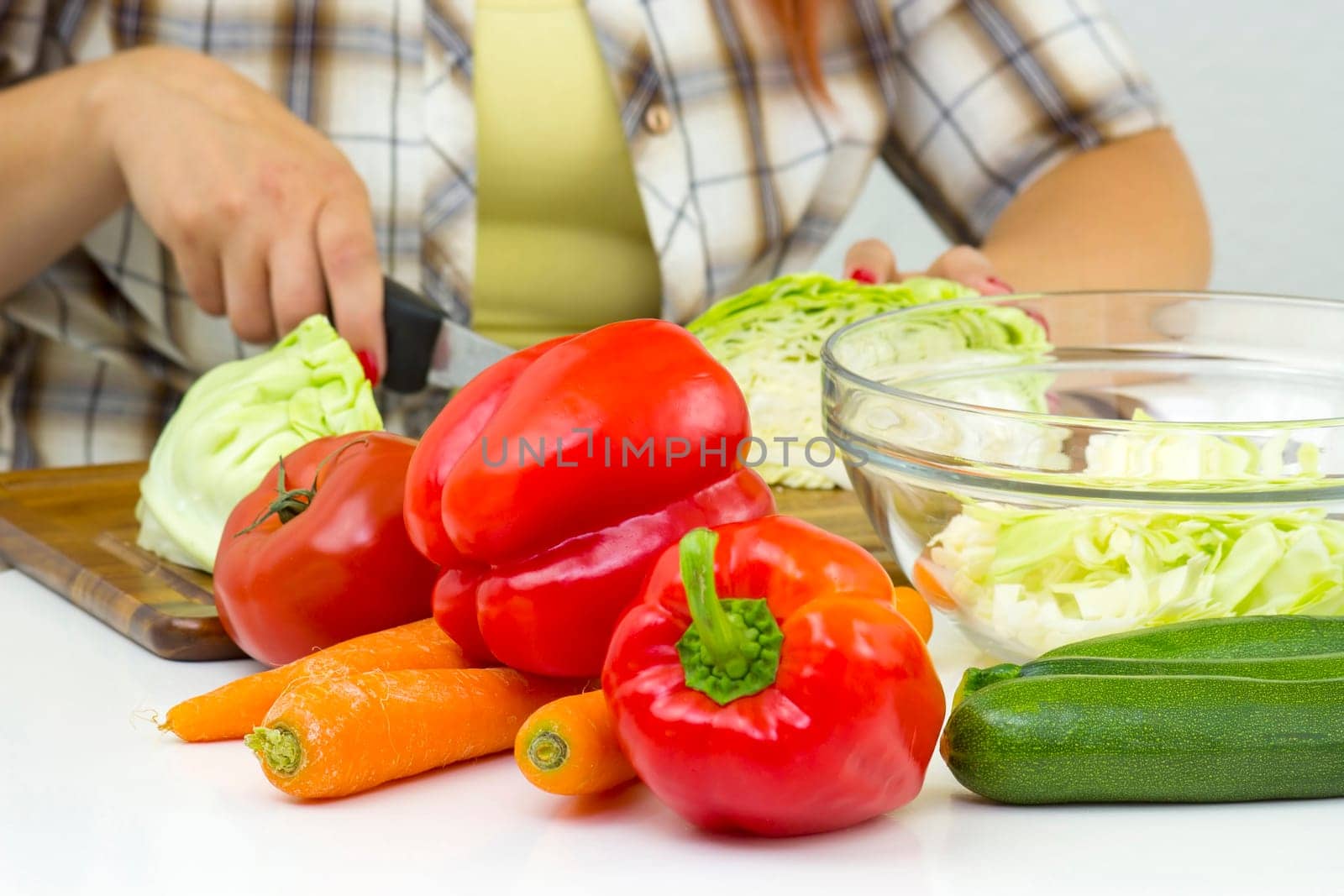 woman cutting vegetables