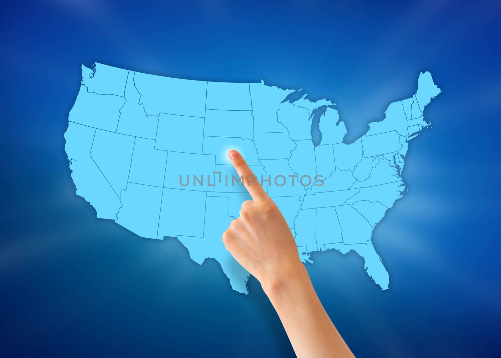 Hand pointing at a United States map on blue background.