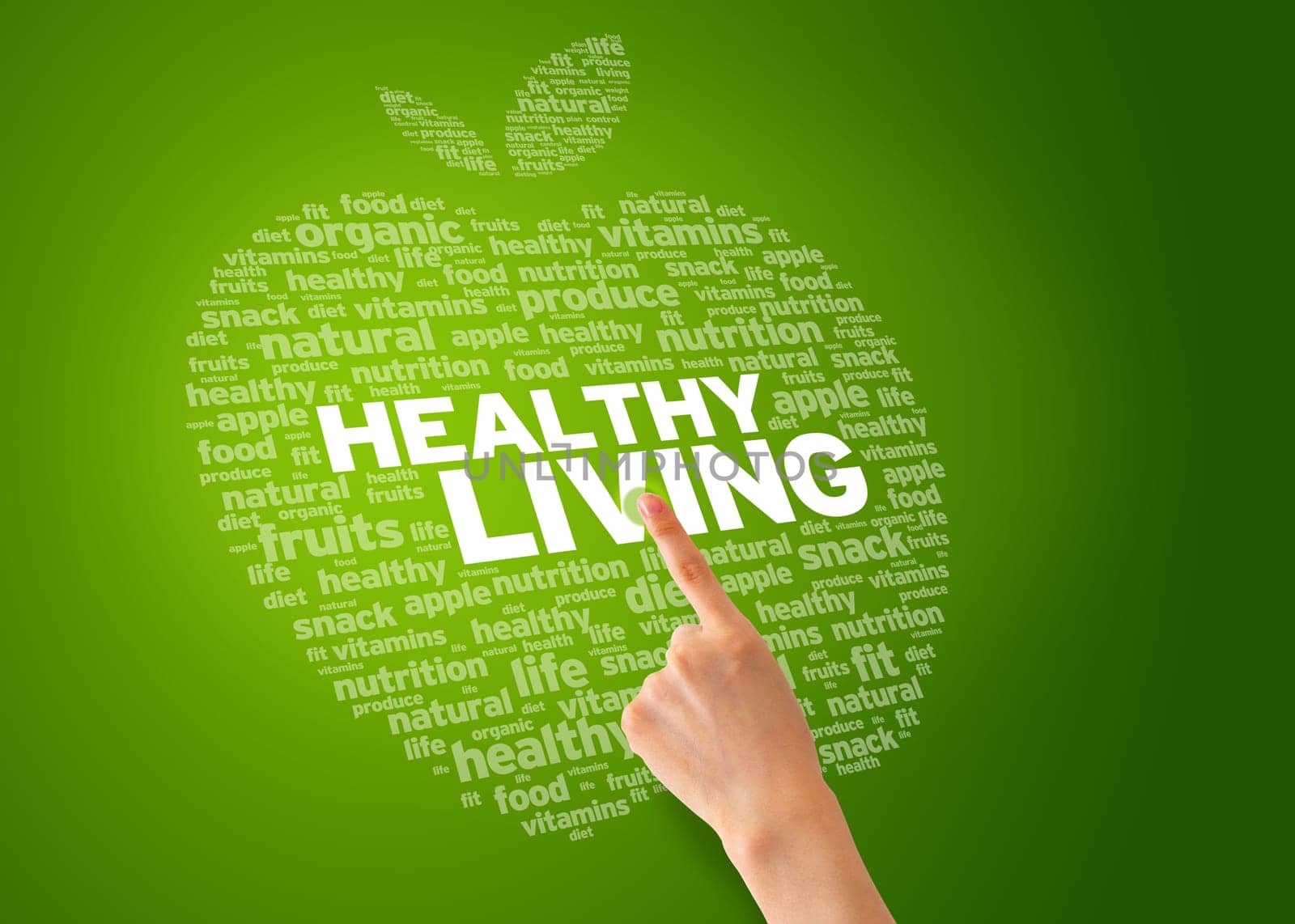 Finger pointing at an Healthy Living Apple on green background.