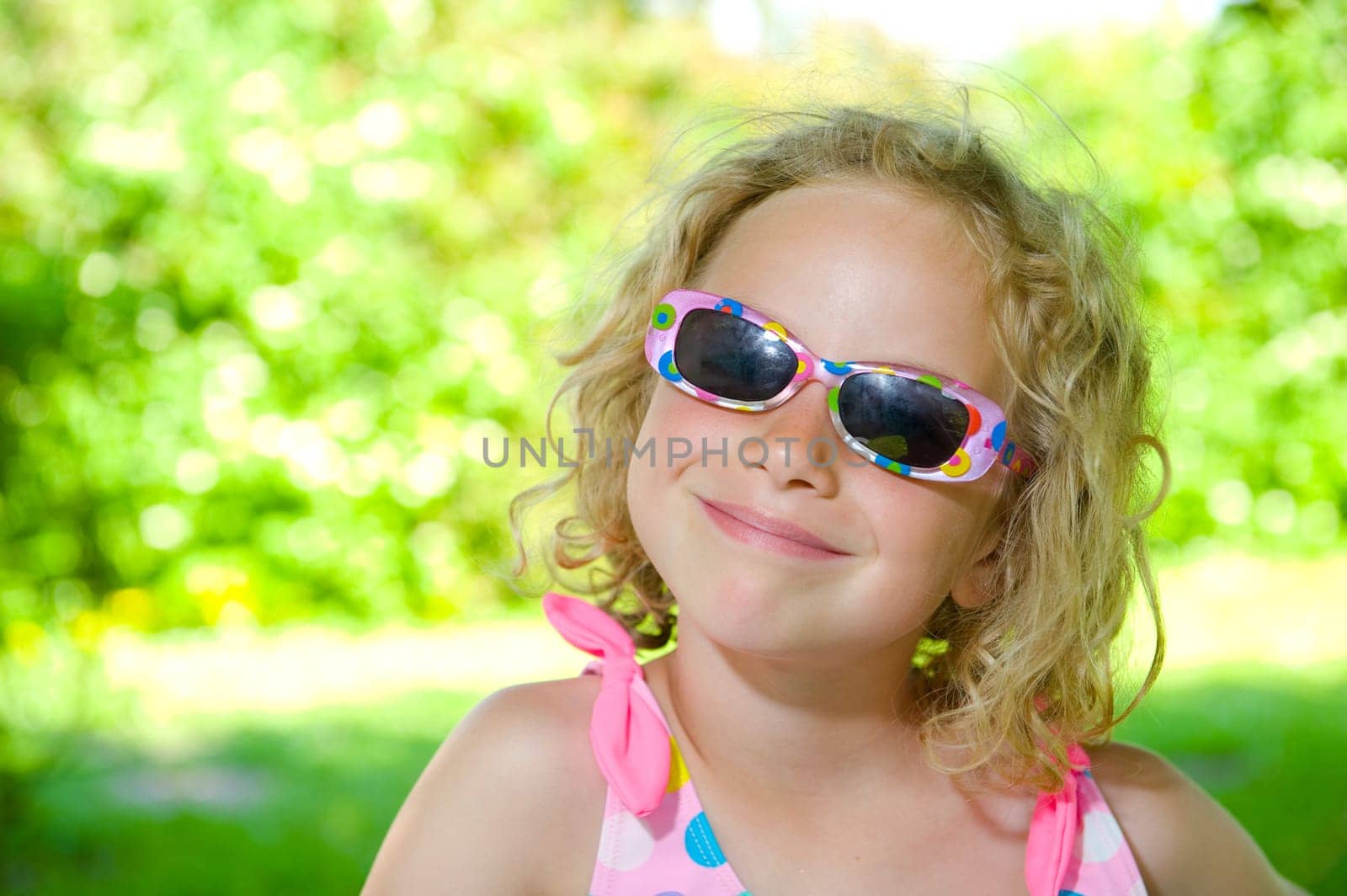 Smiling Girl with Sunglasses