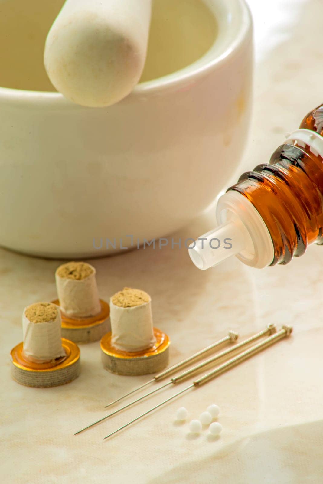 Homeopathic globules and acupuncture needles