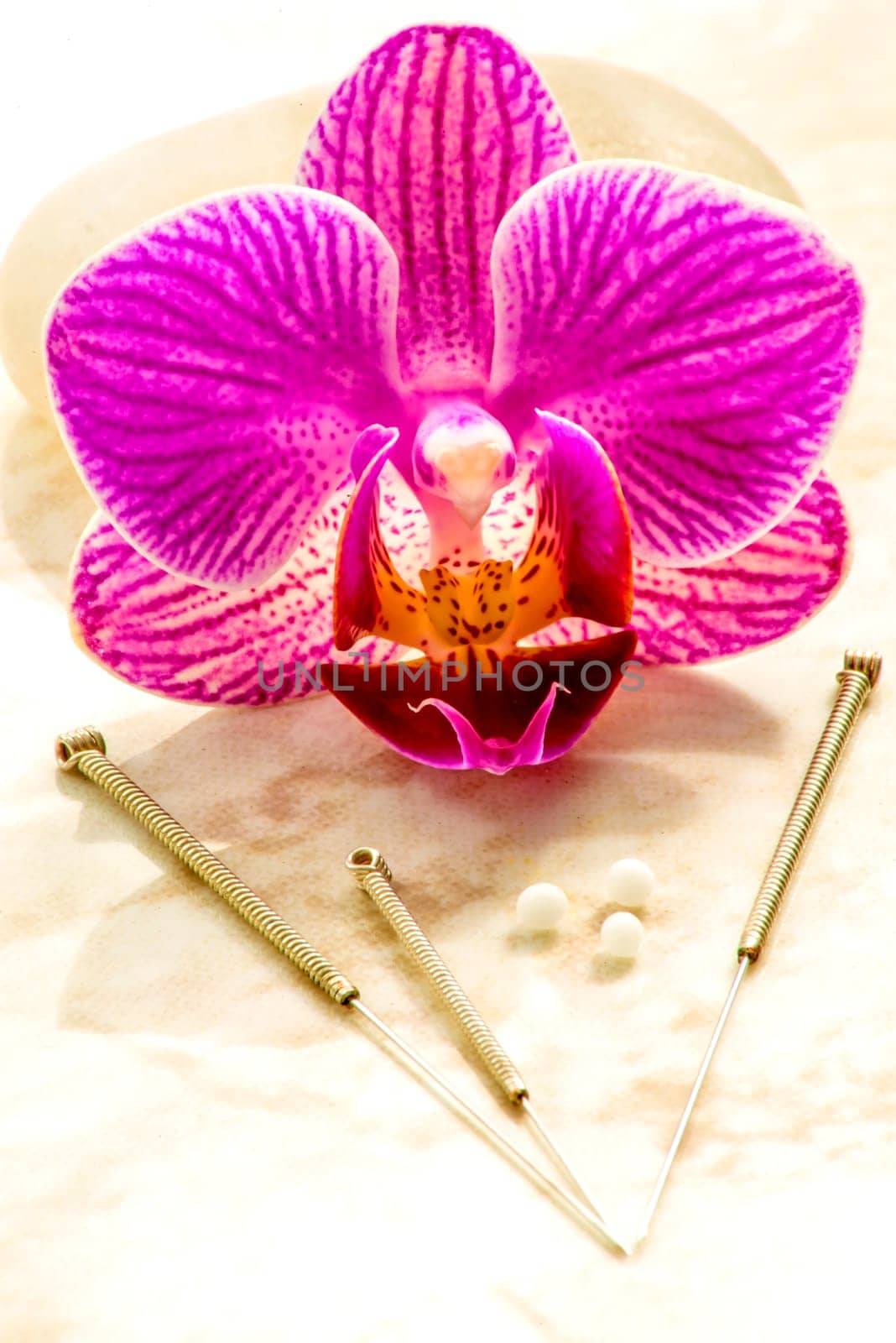 Homeopathic globules and acupuncture needles