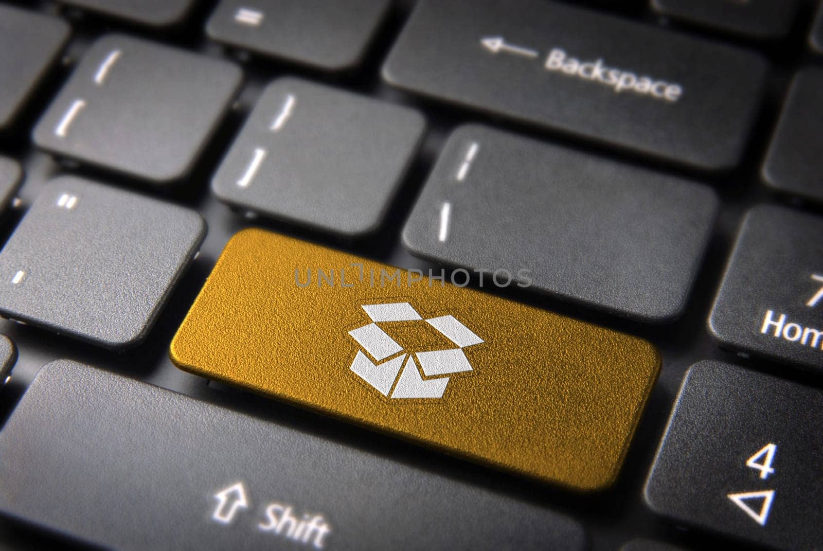 Shipping key with open box icon on laptop keyboard. Included clipping path, so you can easily edit it.