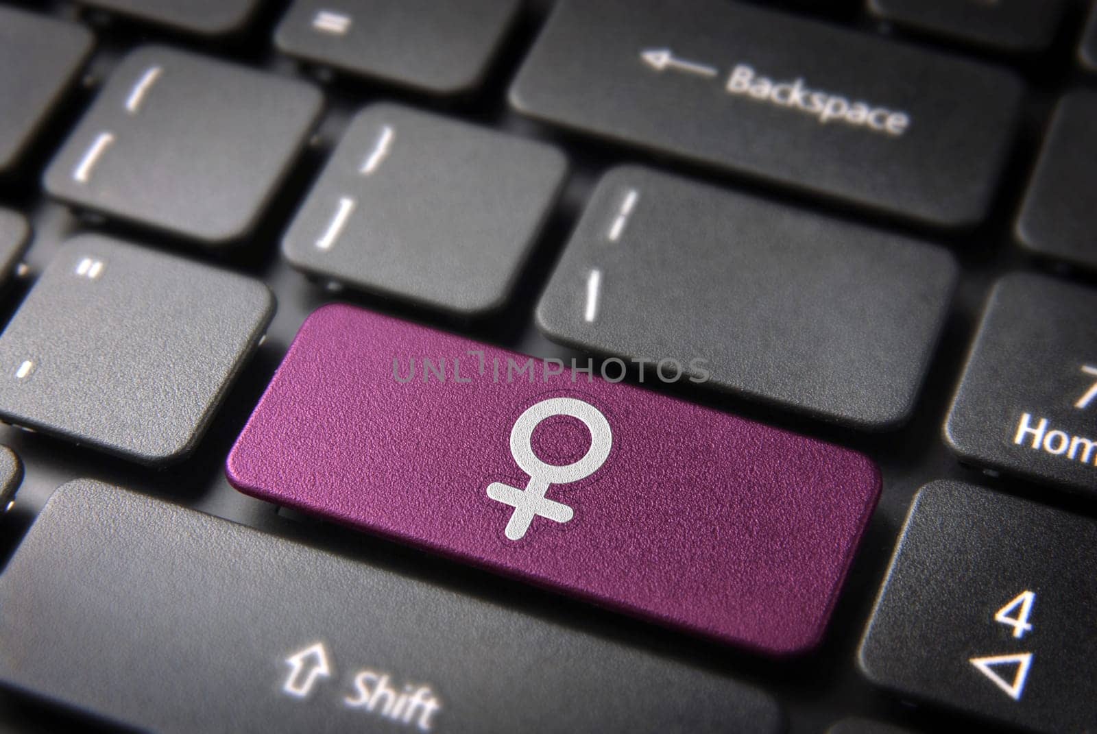 Gender key with Female icon on laptop keyboard. Included clipping path, so you can easily edit it.