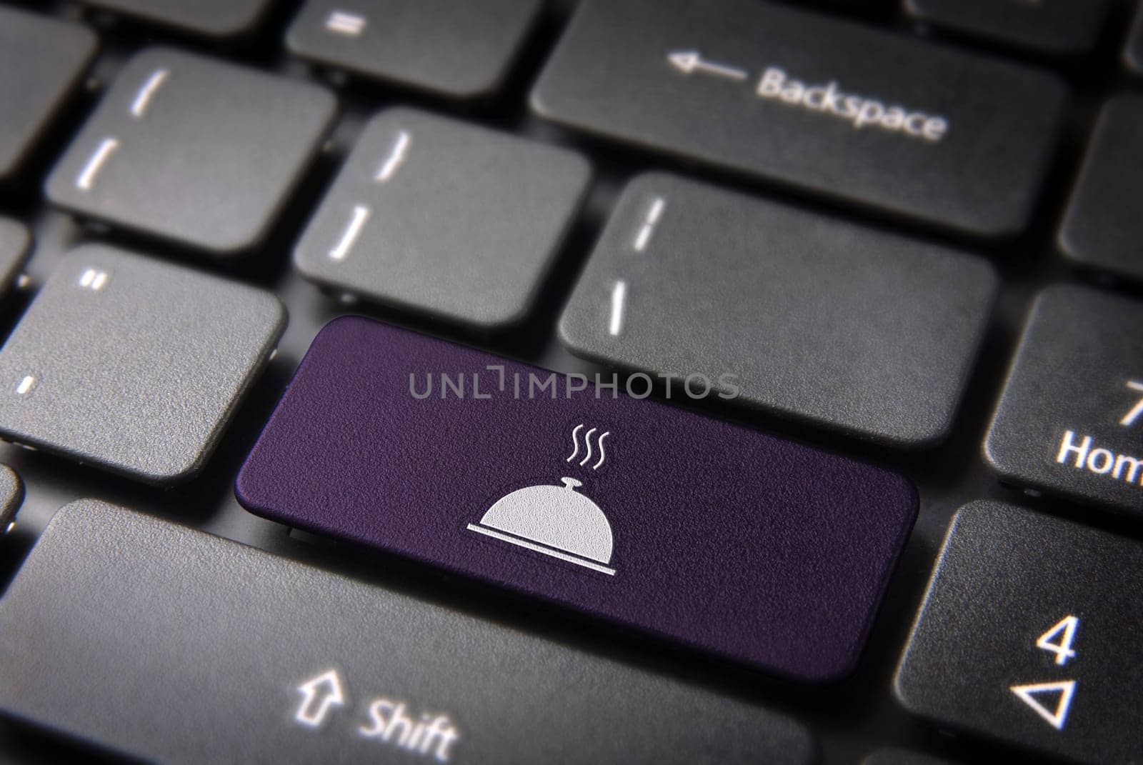 Gourmet key with Gourmet plate icon on laptop keyboard. Included clipping path, so you can easily edit it.