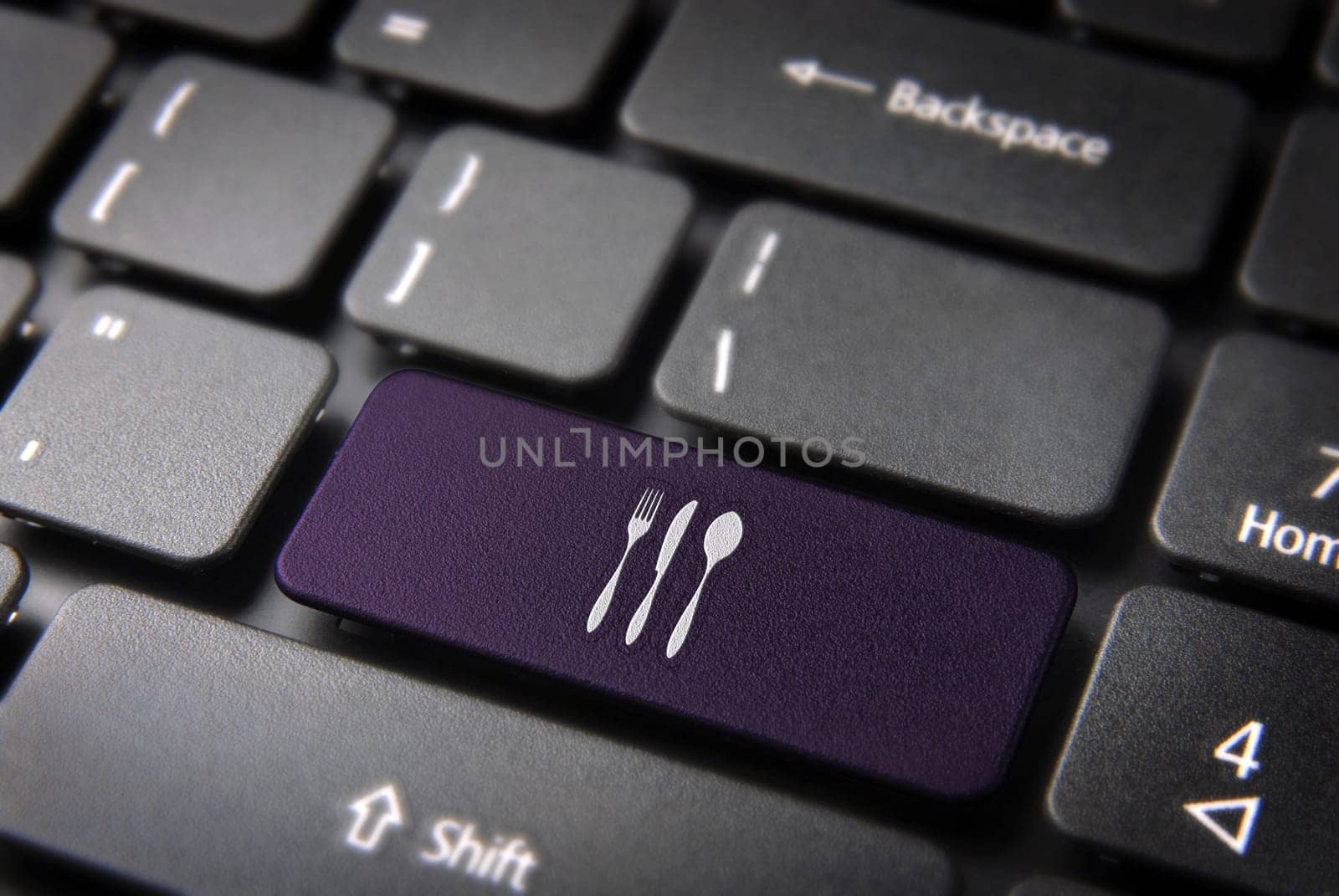 Food key with dishware icon on laptop keyboard. Included clipping path, so you can easily edit it.