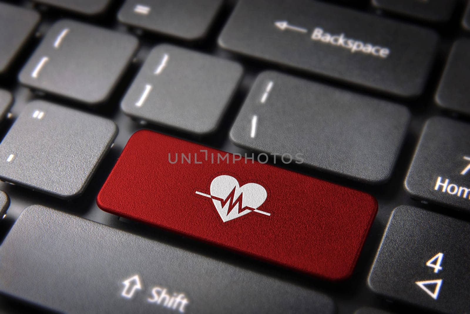 Health key with Heart beat icon on laptop keyboard. Included clipping path, so you can easily edit it.