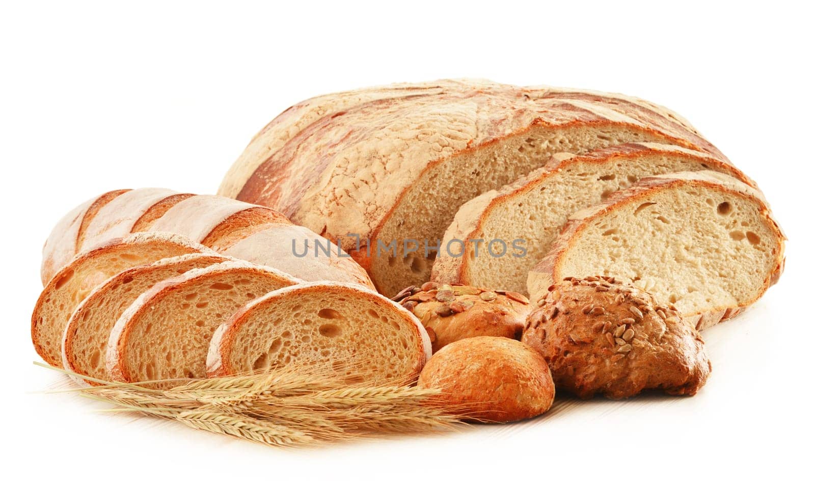 Composition with loafs of bread isolated on white background
