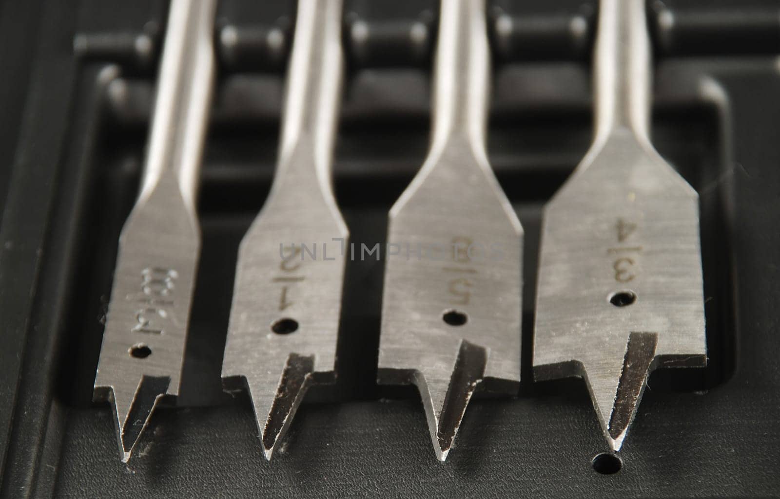 stock pictures of a set of drill bits used to make holes