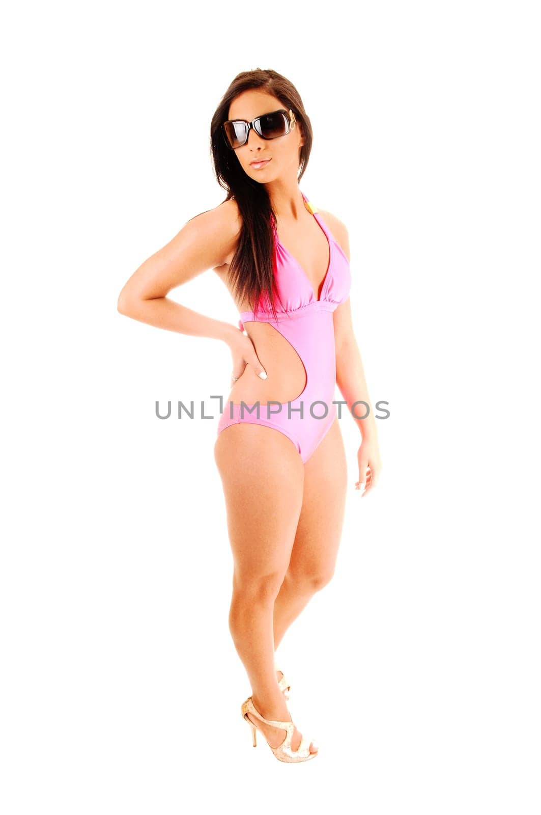 A lull lengths picture of a teen girl is a bikini with her long brunette hair.for white background, with sunglasses on..