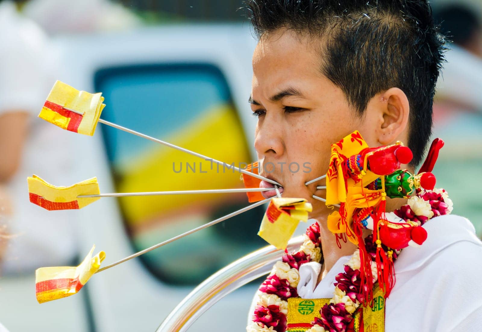 Phuket Vegeterian Festival. Shocking asian tradition - body piercing.