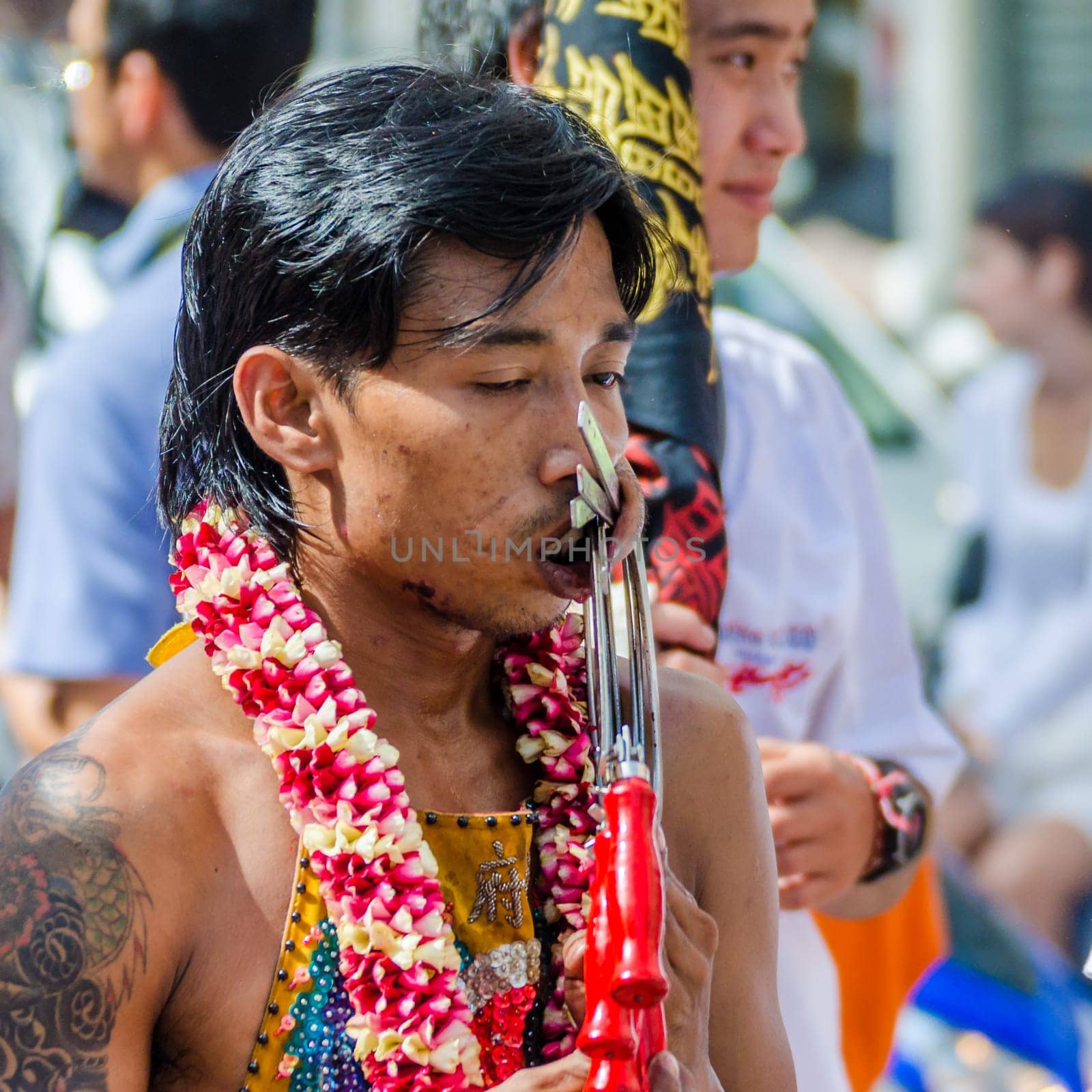Phuket Vegeterian Festival. Shocking asian tradition - body piercing.