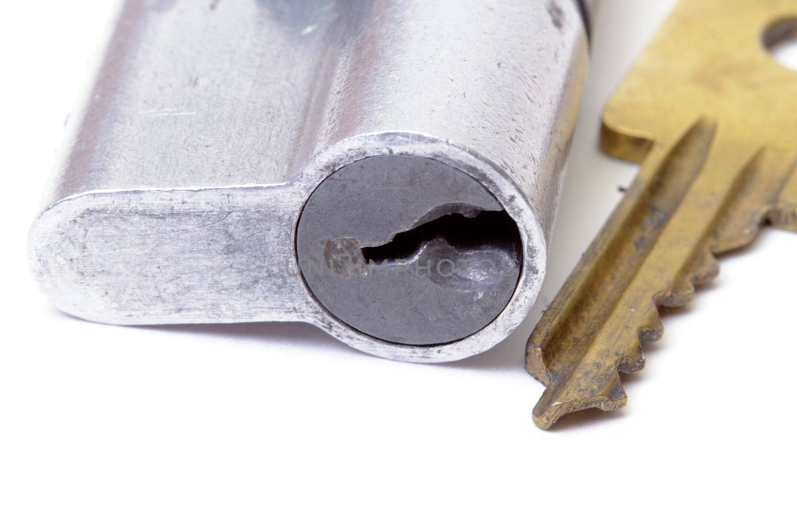 Lock with key on white