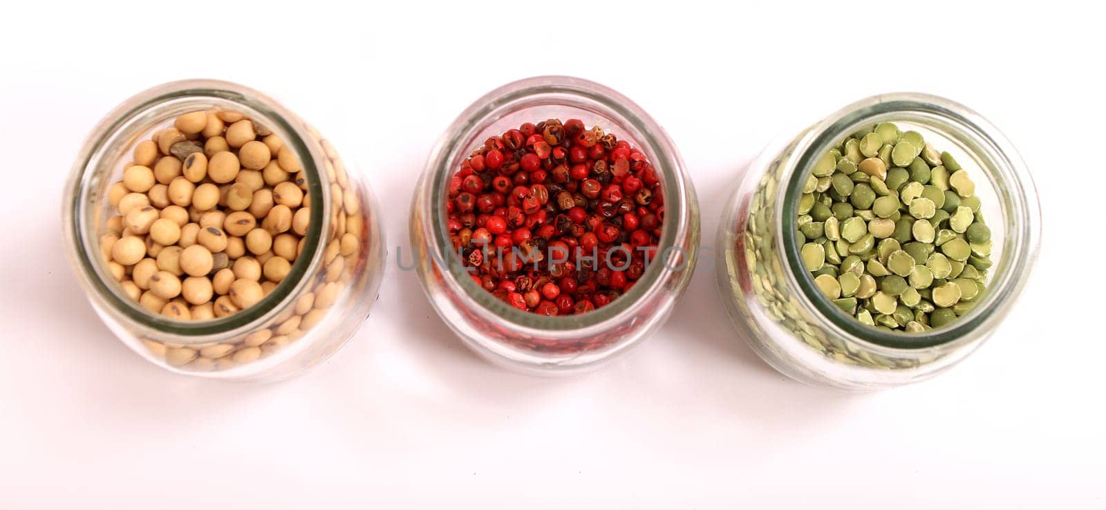 Variety of spices in a glass pot..