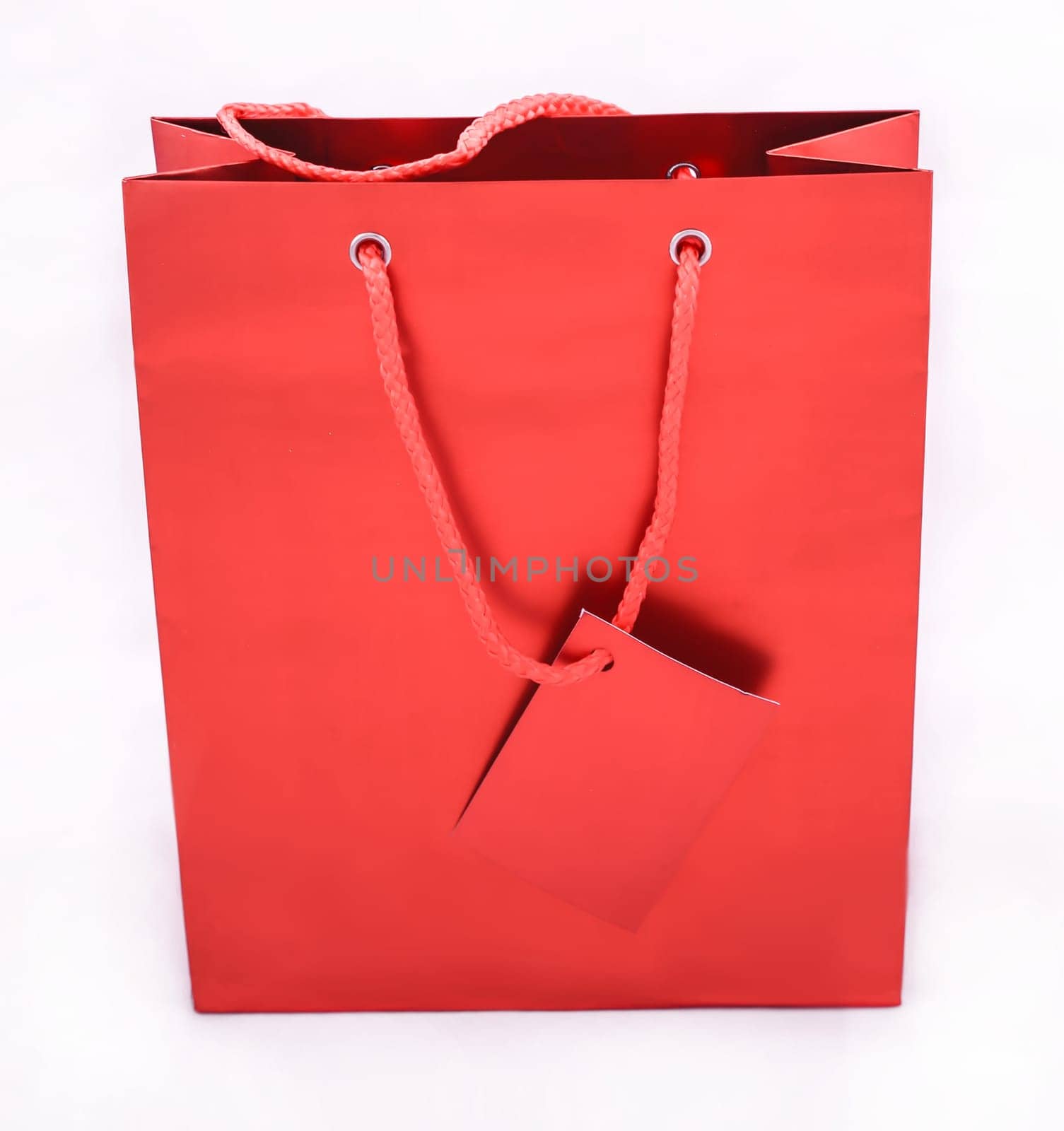 A red gift bag isolated.