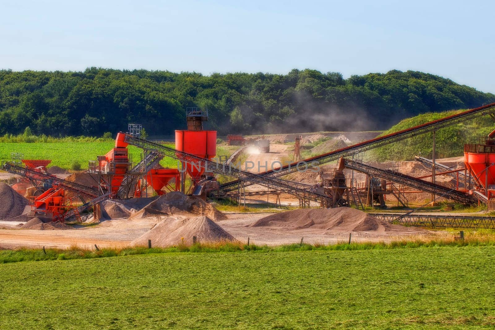 Photograph of a gravel pit with conveyor belts