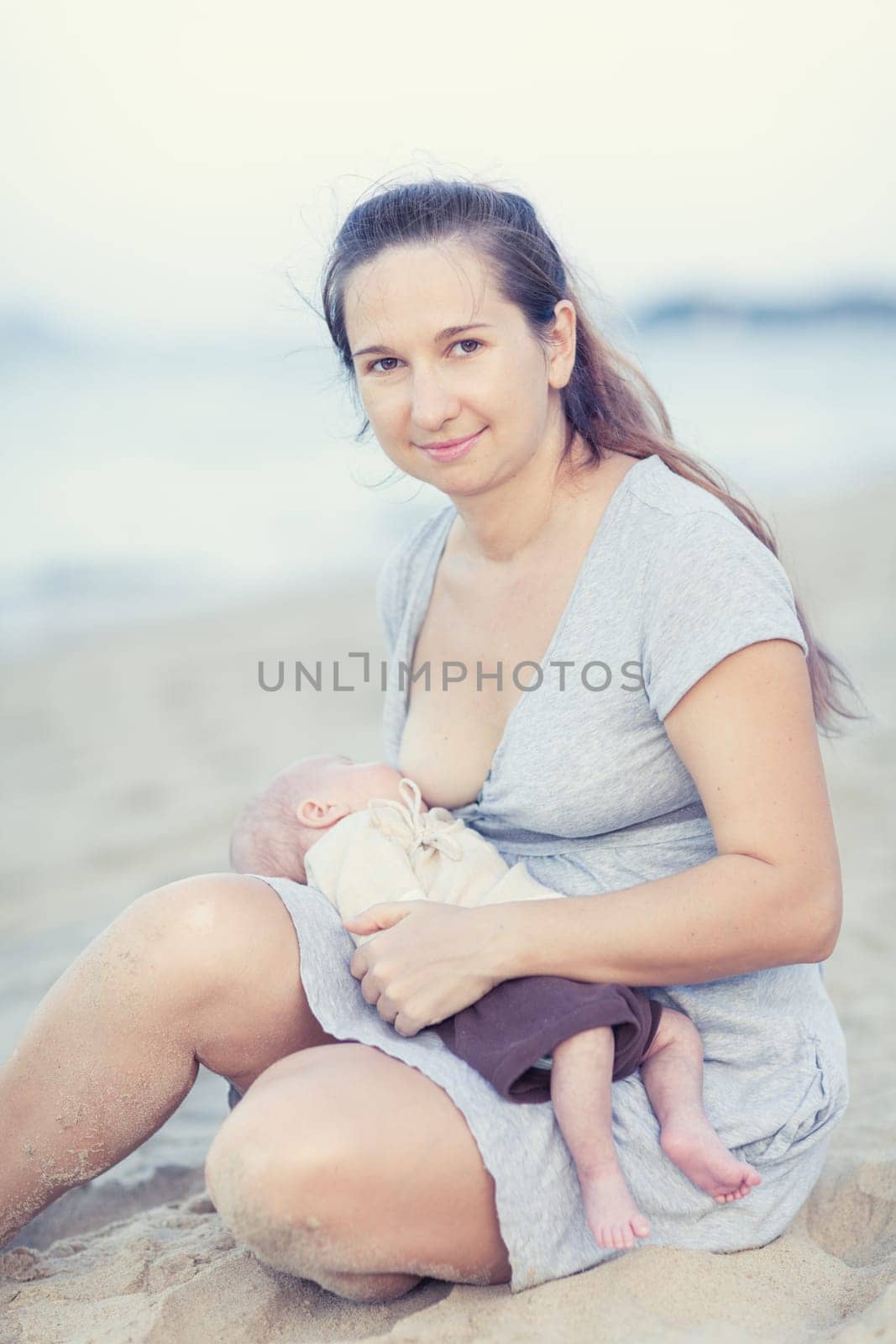 Mother breastfeeding a baby outdoor