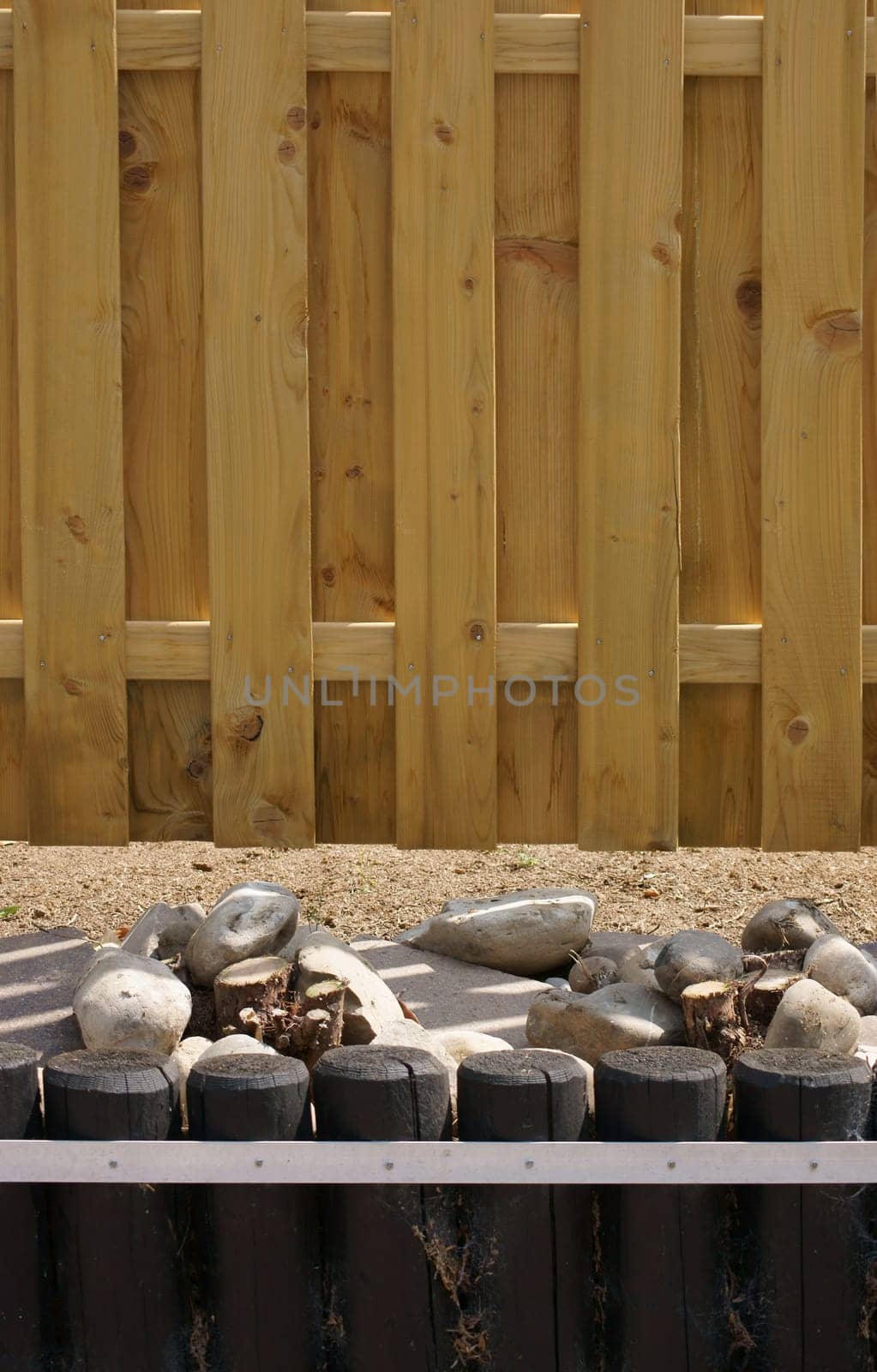 The close-up of a wooden privacy wall.
