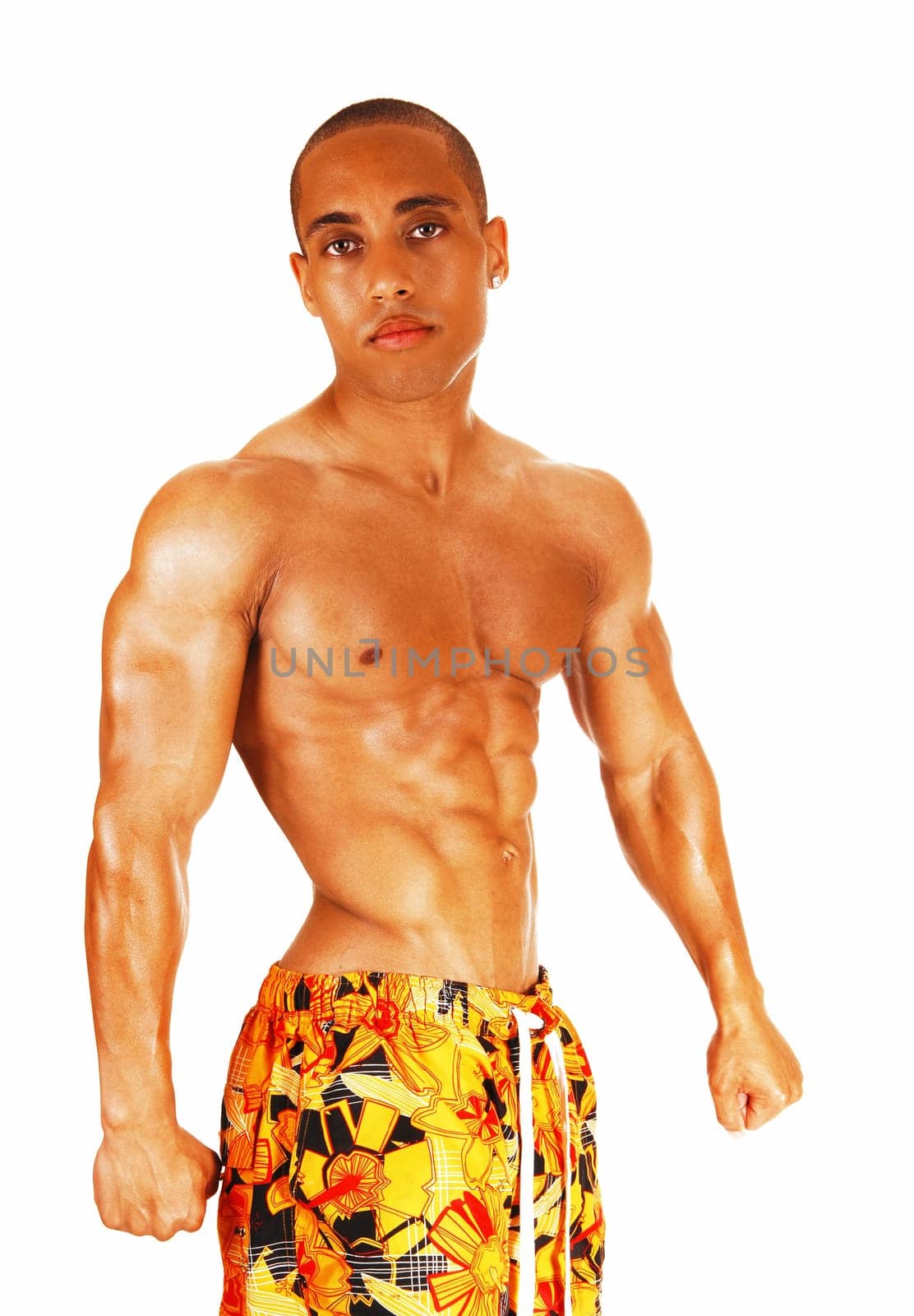 The front few of a muscles young man, standing for white background.making a fist..