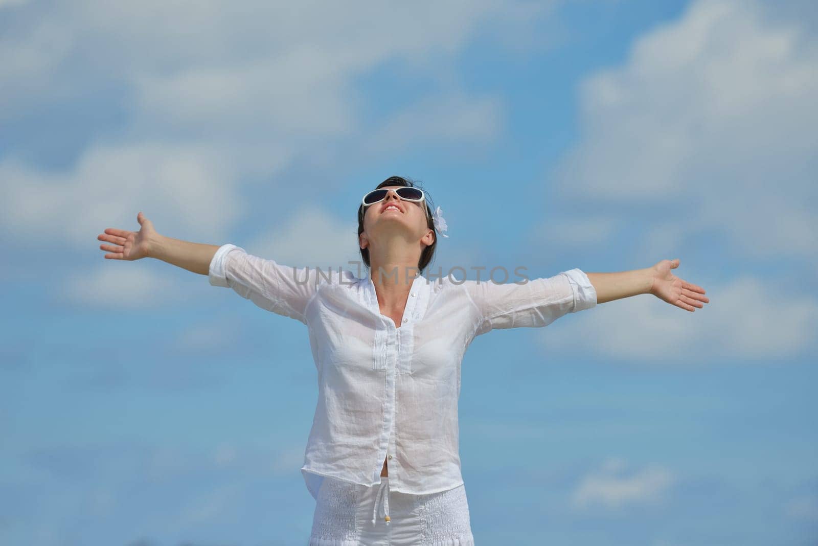 happy young woman on summer vacation on beautiful tropical beach have fun enjoy and relax
