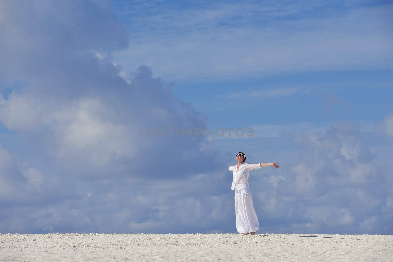 happy young woman on summer vacation on beautiful tropical beach have fun enjoy and relax