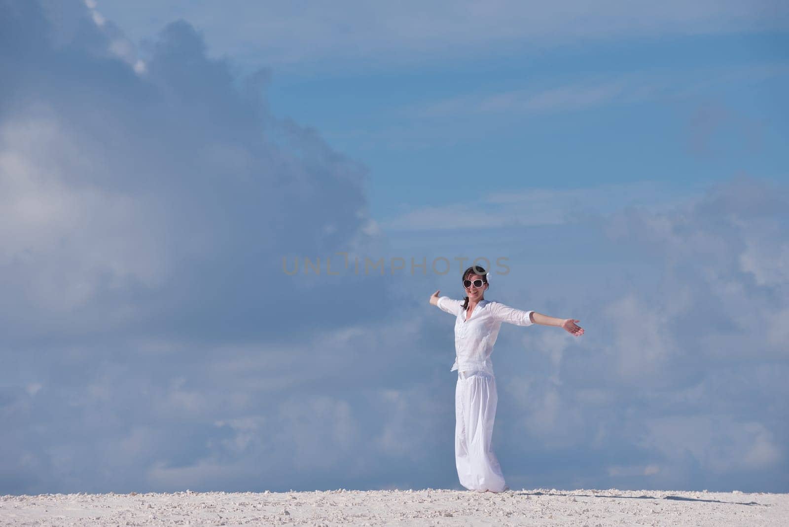 happy young woman on summer vacation on beautiful tropical beach have fun enjoy and relax