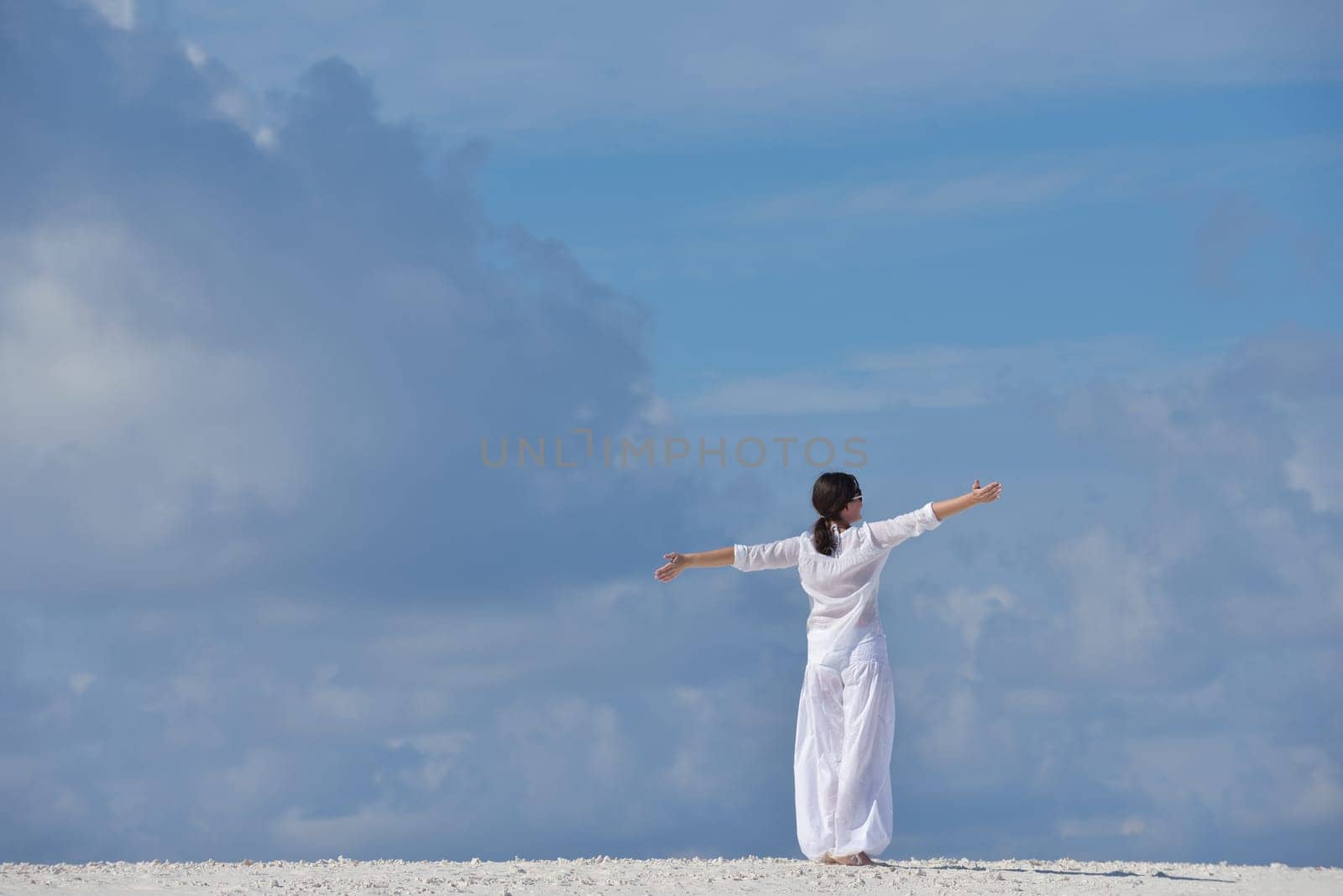 happy young woman on summer vacation on beautiful tropical beach have fun enjoy and relax
