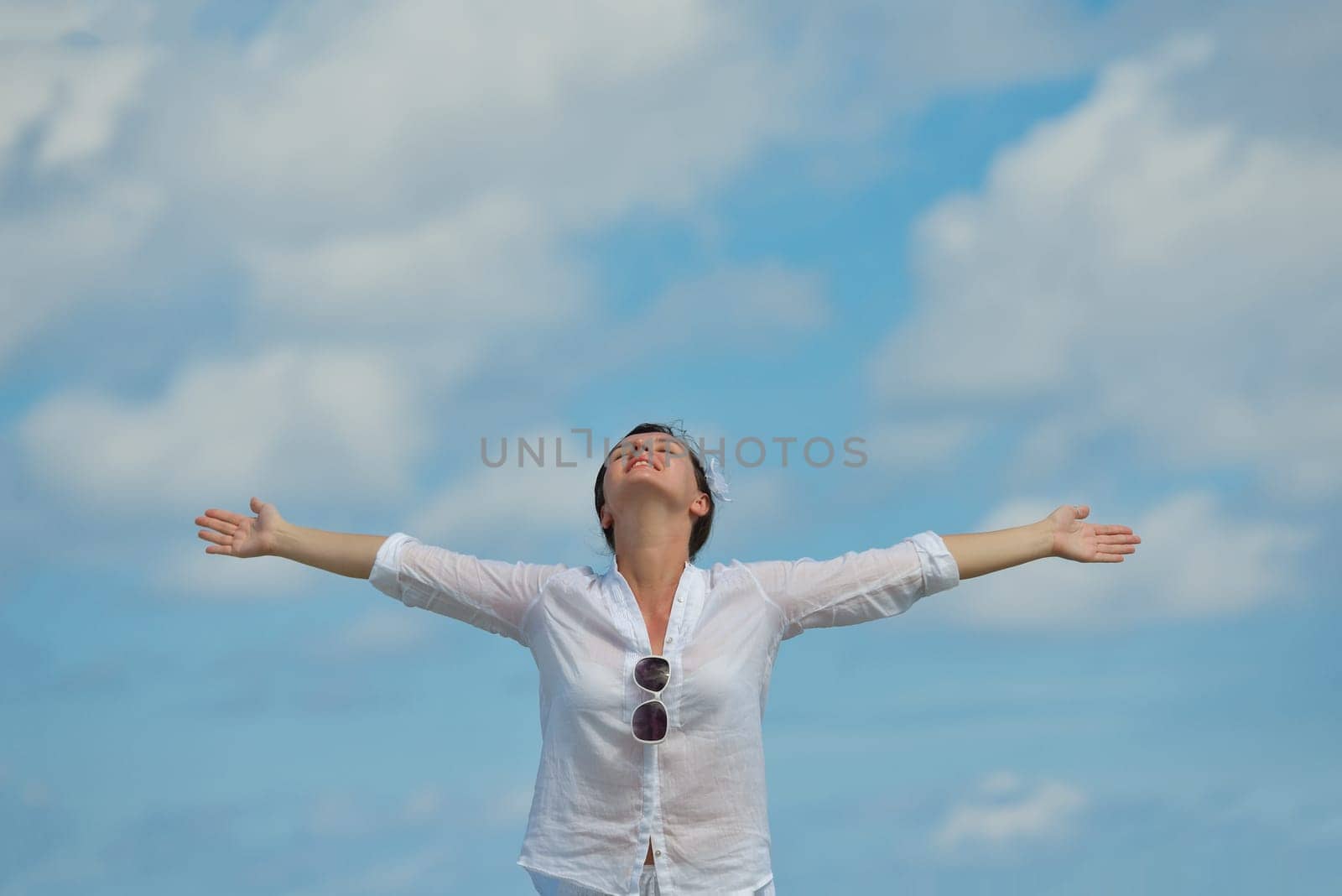 happy young woman on summer vacation on beautiful tropical beach have fun enjoy and relax