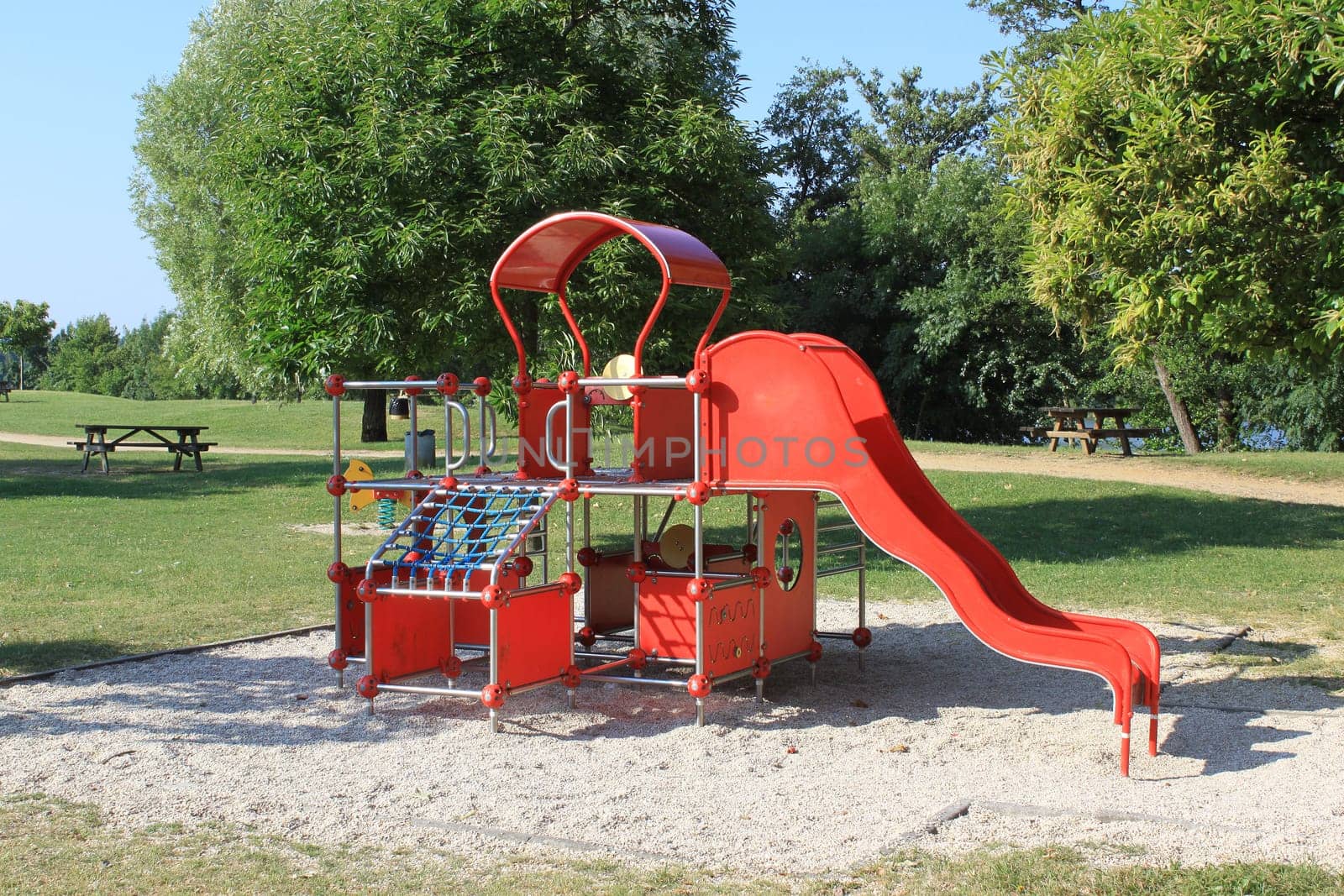 a recreational park with outdoor games for children and picnics