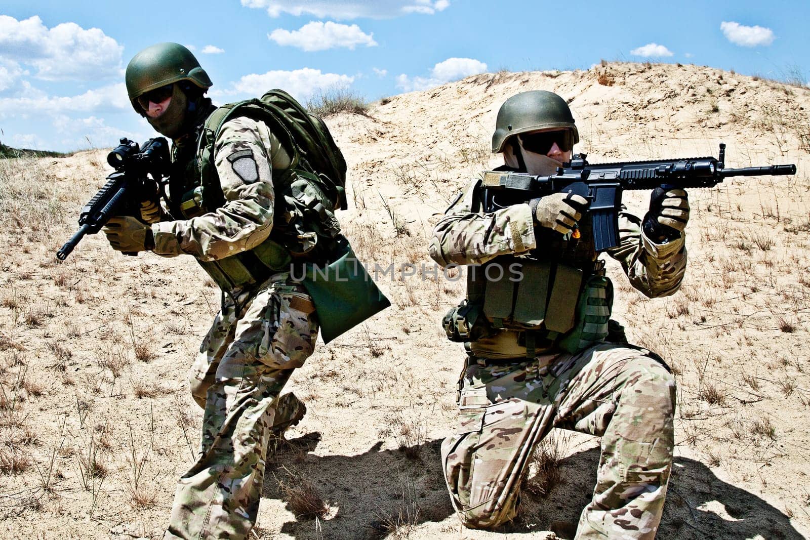 Two soldiers in the desert during the military operation