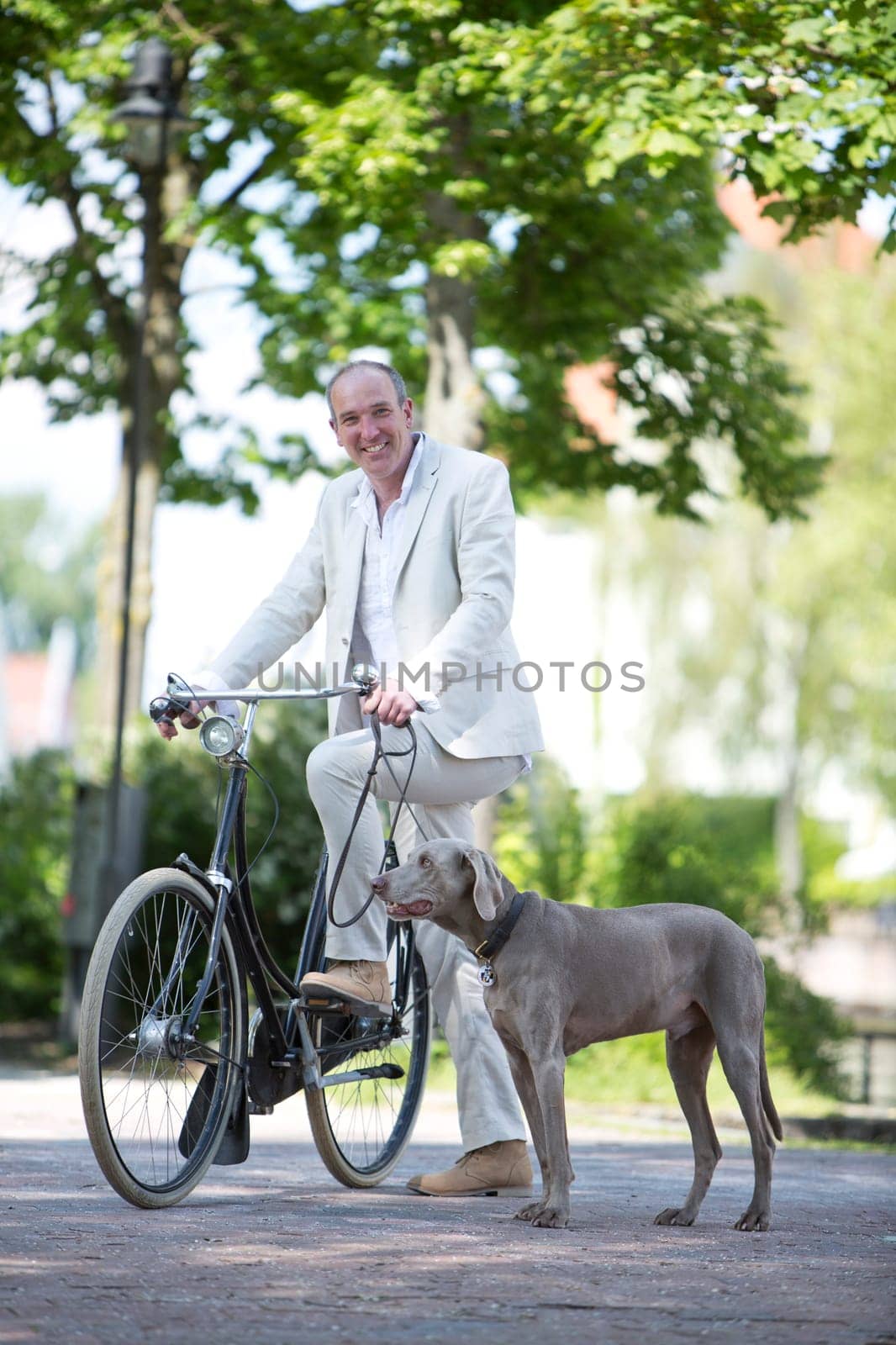 Man with dog and bicycle