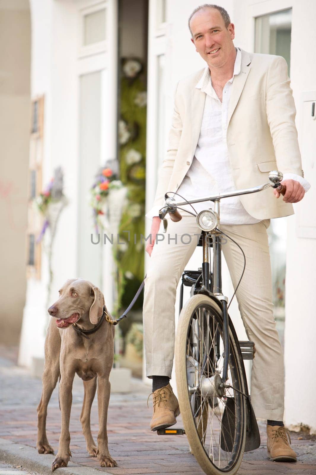 Man with dog and bicycle