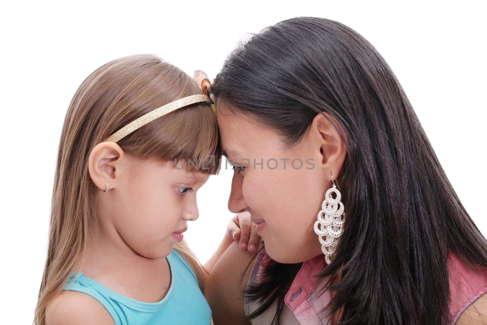 Mother and daughter, isolated on white