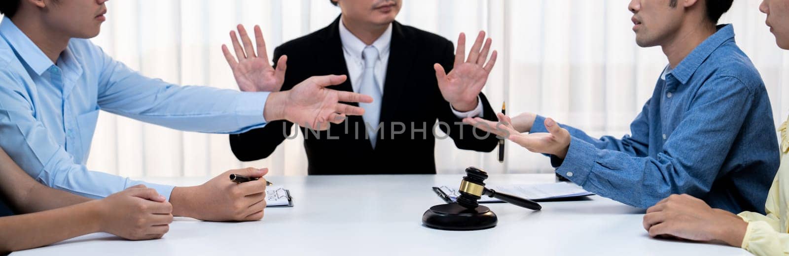 Lawyer acting as mediator broke a compromise between two parties to resolve business dispute through negotiation at law firm office. Legal mediation and conflict resolution service. Panorama Rigid