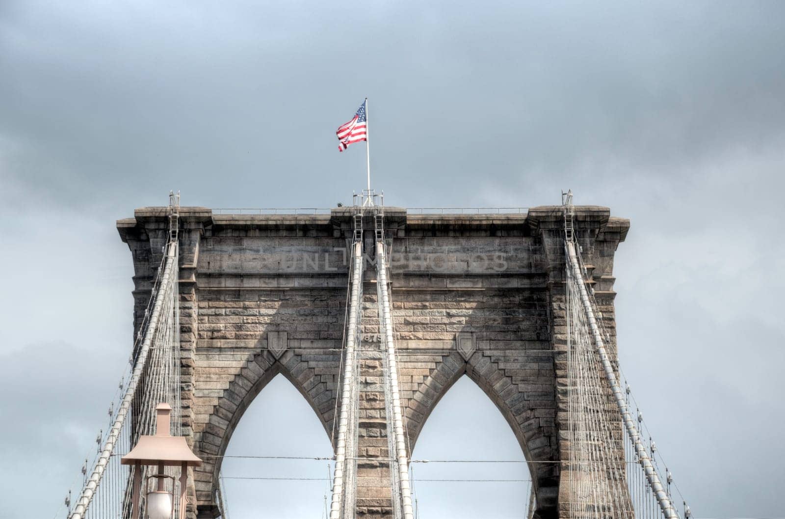 Brooklyn Bridge with American Flag.