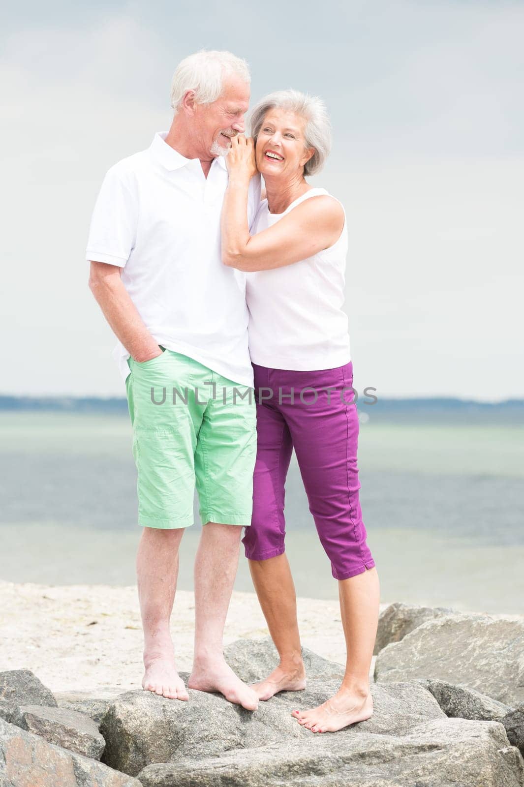 Active senior couple on the beach
