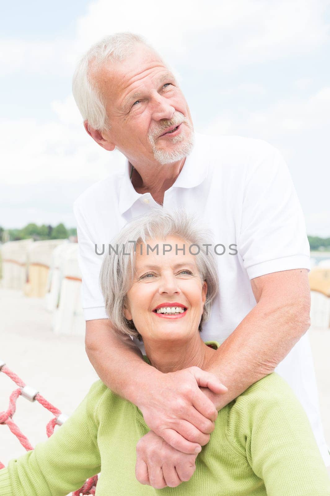 Happy senior couple on the beach